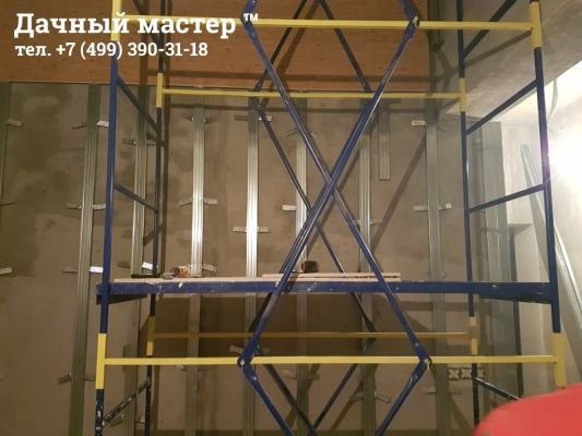 Монтаж металлокаркаса и МДФ панелей в лестничной шахте